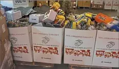  ?? Darrell Sapp/Post-Gazette ?? Rows of shipping boxes loaded with toys at the Toys-forTots Warehouse in November 2017 in West Mifflin.