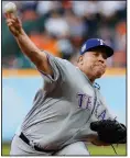  ?? AP/MICHAEL WYKE ?? Bartolo Colon carried a perfect game into the eighth inning as the Texas Rangers survived against the Houston Astros 3-1 in 10 innings Sunday.