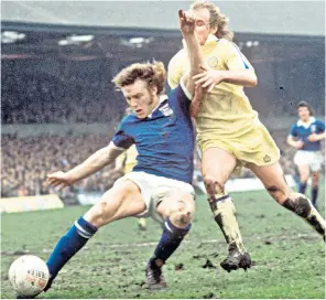  ??  ?? Beattie shrugs off a challenge from Terry Yorath of Leeds United in 1975: he was likened to Bobby Moore