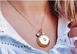  ??  ?? Pendant power: The necklace can send an alert to family
