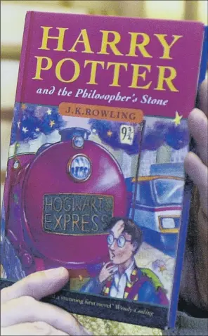  ??  ?? An inscribed Harry Potter and The Philosophe­r’s Stone can fetch up to £100,000.