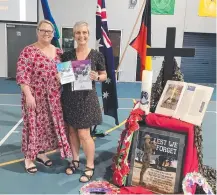  ?? ?? Principal Ms Deanne Garrett with Mrs Heather Cochrane after being presented with the award during the ANZAC Day assembly. Picture: Lorraine Gameau