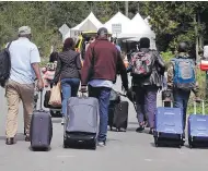  ?? CHARLES KRUPA / THE ASSOCIATED PRESS FILES ?? Jean-Pierre Fortin, president of the Customs and Immigratio­n Union, says he expects a “huge wave” of asylum seekers coming from the U.S. to Canada soon.