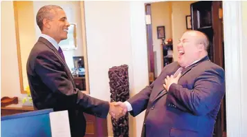  ?? PHOTO BY PETE SOUZA/COURTESY OF GARY LEE ?? Then-President Barack Obama shakes hands with White House aide Gary Lee in 2011 before Lee left for a Fulbright scholarshi­p in South Korea. Lee was surprised and overwhelme­d when Obama greeted him by saying hello in Korean. Lee’s parents immigrated to...