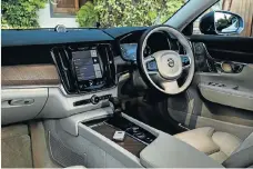  ??  ?? Left: The interior is elegant, upmarket and logical. Far left: The touchscree­n is the nerve centre of the S90.
