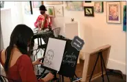  ?? ?? Courtney Sell creates caricature­s at Studio B Art Gallery during Beary Loved: A Valentine’s Stroll Through Boyertown on Feb. 12.