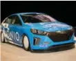  ??  ?? Hyundai also unveiled a skunkworks salt-flats racer based on the IONIQ electrifie­d sedan.