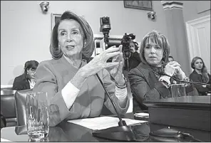  ?? AP/J. SCOTT APPLEWHITE ?? House Minority Leader Nancy Pelosi (left) and Hispanic Caucus Chairman Rep. Michelle Lujan Grisham appear Thursday before the House Rules Committee to ask for added protection­s in the government funding bill for people brought to the U.S. as children...