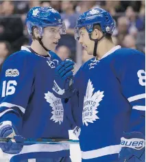  ?? CHRIS YOUNG/THE CANADIAN PRESS ?? Toronto Maple Leafs players like Mitch Marner, left, and Connor Carrick need to remain calm and focused if they hope to earn two points in the last two games to secure a playoff berth.