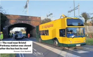  ?? Pictures: Chris Maxfield ?? The road near Bristol Parkway station was closed after the bus lost its roof