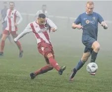  ??  ?? Ryhope CW (white/red)) fire in a shot in their loss against Whickham .