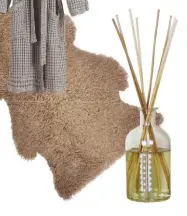  ??  ?? EXTRA SPECIAL Veiros bathrobe, £69, Urbanara. Single British sheepskin taupe, £62.99, Wool Room. Sandalwood & Oud refillable diffuser, £35, Brownstone London