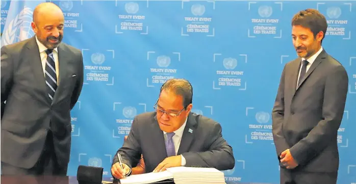  ?? Picture: OFFICE OF THE PRESIDENT, FEDERATED STATES OF MICRONESIA ?? President of the Federated States of Micronesia Wesley Simina, signs the BBNJ Agreement at the UN Headquarte­rs in New York, US.