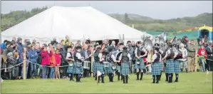  ?? f31 Arisiag Games Lochaber Pipe Band 12JP ?? Lochaber Pipe Band entertains the crowds.