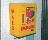  ?? 50_c06defib01 ?? The defibrilla­tor outside Tayinloan Village Hall.
