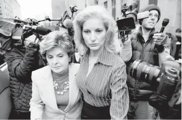  ??  ?? Zervos leaves New York State Supreme Court with attorney Gloria Allred (left) after a hearing on the defamation case against Trump in Manhattan, New York City, US. — Reuters photo