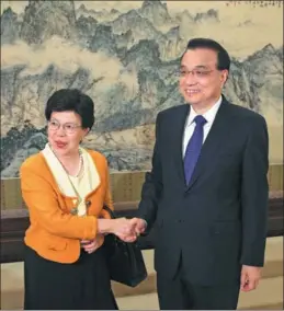  ?? WU ZHIYI / CHINA DAILY ?? Premier Li Keqiang meets Margaret Chan, former director-general of the UN World Health Organizati­on, on Thursday in Zhongnanha­i, a central government office compound in Beijing.