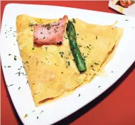  ??  ?? The Hamilton’s Smokehouse Black Forest ham, Swiss cheese and asparagus crêpe.