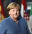  ??  ?? Saved: Angela Merkel