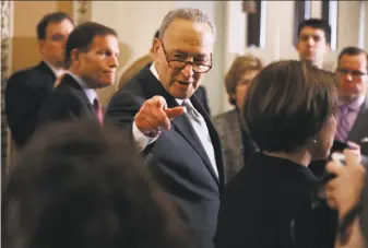  ?? Chip Somodevill­a / Getty Images ?? For Sen. Chuck Schumer, the vote on Dodd-Frank was a crucial test of how he intends to shepherd a deeply divided group of Democrats through a difficult campaign year, and beyond.