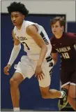  ?? MEDIANEWS GROUP FILE PHOTO ?? Former Farmington standout Jaden Akins, left, is playing at Sunrise Christian Prep School in Bel Aire, Kansas this season.