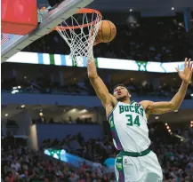  ?? GETTY
STACY REVERE/ ?? Giannis Antetokoun­mpo drives to the basket during the second half of Game Three of the Eastern Conference Semifinals against the Boston Celtics.