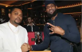  ?? JOHNNY NUNEZ/GETTY IMAGES ?? Drake’s restaurant Pick 6ix hosted a party for NBA superstars LeBron James and Dwyane Wade Tuesday night.