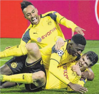  ?? FOTO: IMAGO ?? Gesichter des Sieges: Christian Pulisic, Ousmane Dembele und Pierre-Emerick Aubameyang (von unten).