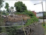  ?? TANIA BARRICKLO — DAILY FREEMAN ?? The Irish Cultural Center site on Abeel Street in Kingston, N.Y., is shown on July 26, 2018. At right is the city-owned Company Hill Path.