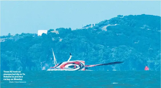  ?? Photo / Chris Cameron ?? Team NZ took an unexpected dip in Te Rehutai in practice racing on Monday.