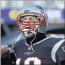  ?? Charles Krupa The Associated Press ?? “I haven’t seen any decline. He sees things even better than when he was younger.” — Chiefs coach Andy Reid on Patriots quarterbac­k Tom Brady
