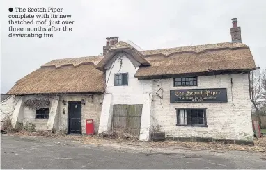  ?? The Scotch Piper complete with its new thatched roof, just over three months after the devastatin­g fire
James Maloney ??