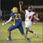  ?? SERGIO BASTIDAS PHOTO ?? Imperial High’s Joseph Tarango attempts a pass against Brawley Union High during the 10th Game of The Week of the season at Warne Field on Friday night.