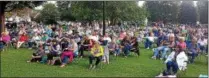  ?? PHOTO PROVIDED ?? Local event-goers set up chairs in Powers Park to watch the annual Saturday night summer concert series.