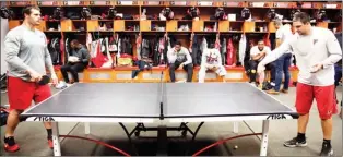  ?? The Associated Press ?? Atlanta Falcons' Andy Levitre, left, plays against teammate Josh Harris in a game of pingpong in the locker room at the team's practice facility in Flowery Branch, Ga. For the Super Bowl-bound Falcons.