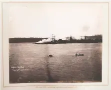  ??  ?? A vintage print shows the left side of H.T. Devine's three-part panorama photo of the Vancouver waterfront before the Great Fire in 1886. Hastings Mill is seen in the background.