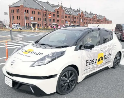 ??  ?? A Nissan Leaf, used for the ‘Easy Ride’ robo-vehicle mobility service, is seen during a test drive in Yokohama on Wednesday.