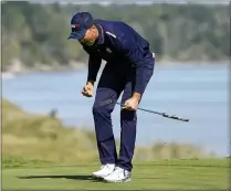  ?? JEFF ROBERSON — THE ASSOCIATED PRESS ?? Team USA’s Jordan Spieth reacts after making a putt on the 16th hole during a foursomes match the Ryder Cup at the Whistling Straits Golf Course on Saturday in Sheboygan, Wis.