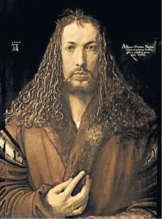  ??  ?? Creator: His hair long and flowing, one hand raised, Dürer is reminiscen­t of Christ in his celebrated self-portrait