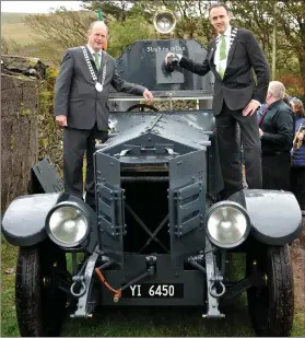  ??  ?? South and West Kerry Municipal Area Chairman Cllr Seamus Cosaí Mac Gearailt (FG) and Deputy Mayor of Kerry Cllr Patrick Connor Scarteen (FG), ready for road on Collins’s armoured car at the Tomás Ághas commemorat­ion in Cínn Áird