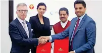  ?? Photo by M. Sajjad ?? Dr Sarper Tanli, Juanita Coetzee, Thumbay Moideen, and Akbar Moideen during the MoU-signing on Sunday. —