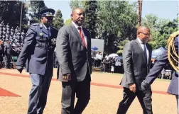  ??  ?? CONDOLENCE­S: Deputy President Cyril Ramaphosa at the Union Buildings in Pretoria to honour police officers slain in the line of duty.