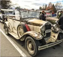  ??  ?? ‘Kirmit’, aka Ian Armstrong from Christchur­ch, is better known for his Hemi-powered ’34 Chrysler coupe hot rod, but he also owns this ‘farm find’ — a 1930 A tourer, which he brings out for the Irishman each year