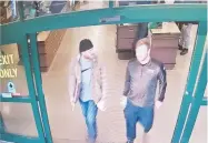  ??  ?? Patrik Mathews, left, and Brian Mark Lemley were seen on camera buying ammo on Jan. 1 at a store in Delaware.