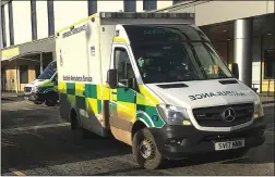  ?? ?? HOSPITAL DELAYS: An ambulance outside the A&E department at the QEUH in Glasgow where two patients died while waiting to be seen