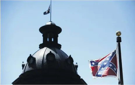  ?? Rainier Ehrhardt / the Associat ed Press files ?? The South Carolina Senate voted 37-3 on Monday to remove the Confederat­e flag from the South Carolina Statehouse in Columbia, S.C. There are indication­s the proposal could have a tougher road in the House.