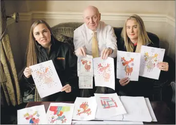  ??  ?? Judges Jodie Jordan and Sophie Kerr, from Ferguson Transport and Shipping, together with Rotarian Ken Johnston sift through the record number of entries; and right, Phoebe’s winning entry.