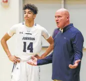  ?? Tom Reel / Staff photograph­er ?? Johnson coach Jay Keller, right, explains a situation to Jaren Randle. The Jaguars are 18-8, 5-0 in 27-6A.