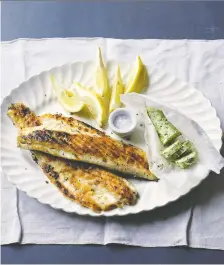  ?? KYLE/CANADIAN MANDA GROUP ?? Cooking teacher Darina Allen serves her pan-grilled fish alongside butter flavoured with lemon juice and parsley.