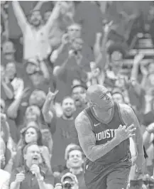  ?? Brett Coomer / Houston Chronicle ?? Rockets forward P.J. Tucker delights the crowd with a 3-pointer in Game 5. Tucker scored 15 points in the series clincher.